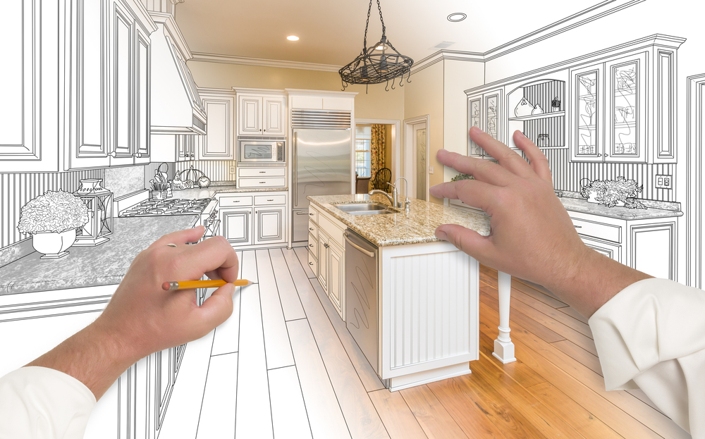 Male,hands,sketching,with,pencil,a,custom,kitchen,with,photo