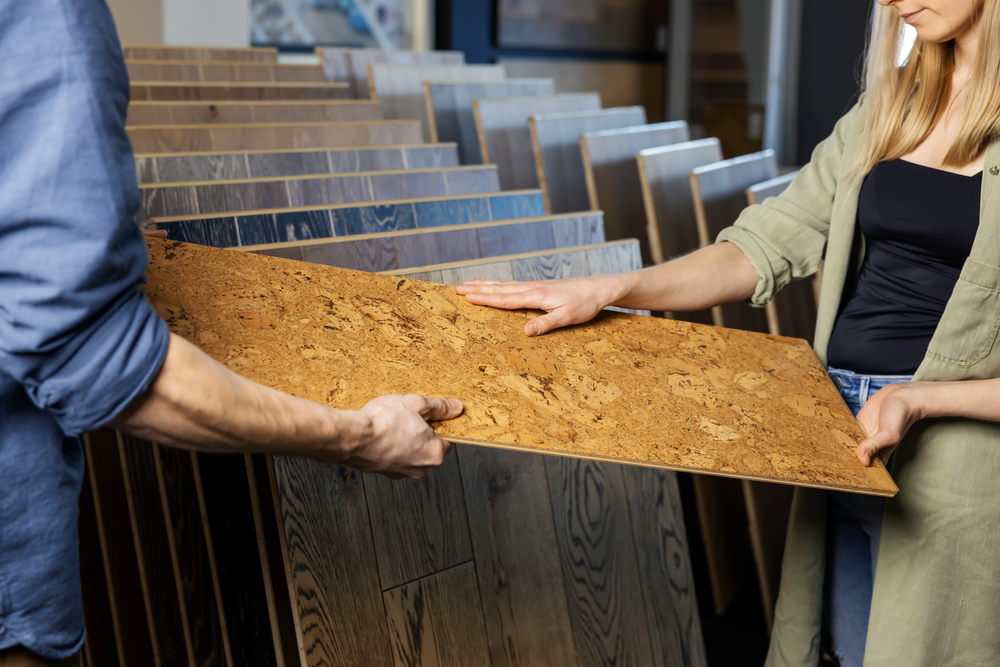 Young,couple,choosing,cork,floor,for,home,improvements,in,flooring