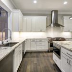 Large,,spacious,kitchen,design,with,white,kitchen,cabinets,,white,kitchen